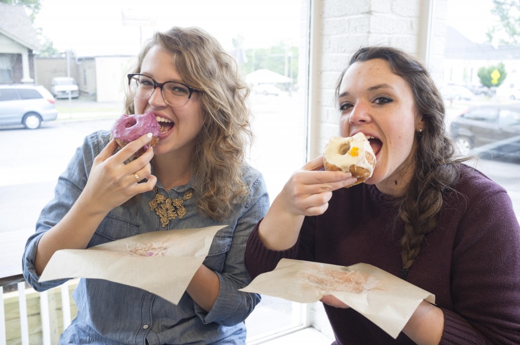Kelsey and Rachel eat donuts